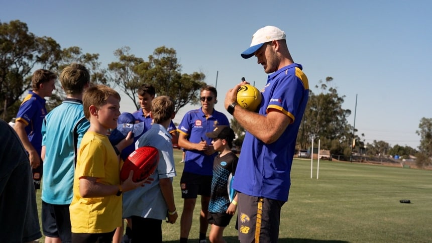 Familiar faces for Robertson at community camp